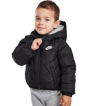 NIKE Hooded Chevron Puffer Jacket. - - . Features an all-over chevron stitch pattern and colour-block accent. - - . The full-zip closure makes layering easy and there are pockets to store your small essentials. - - . Water-resistant finish and full-coverage hood help keep kids dry in lighter rains.