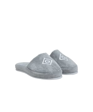 Hausschuhe von der Marke GANT.
Einfarbige Slipper mit Logo auf der Vorderseite.
Langanhaltender Komfort.
100% Baumwolle.