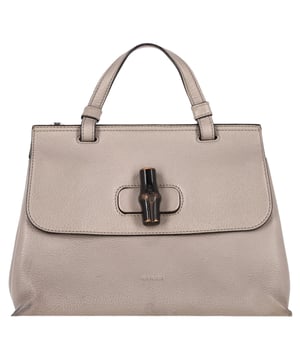 VINTAGE, RRP AS NEW

The Gucci Bamboo Daily bag is another favorite from the brand's collection of bags for women. It features a leather exterior with a bamboo turn-lock closure on the flap. A flat top handle and a detachable leather shoulder strap make this bag easy to carry in your hand, on your shoulder, or across your body.


with dust bag

Gucci Bamboo Daily Top Handle Bag Small in Grey Leather 
Condition: very good
Signs of wear: No retail tag, No visible sign of wear., 
Packaging: Dust bag
Color: grey
Material: Leather | leather
Size: One Size | One Size
Measurements: Width: 80; Height: 210; Length: 270; Handle drop: 80
SKU: TONPUGBBA423228W