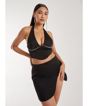 This Diamante Halter Neck Top is the perfect addition to any outfit for party season. With v neckline, this versatile style is the slay of the season.