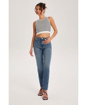 Model is 5'6 and wears a size 8. High waist.  These jeans feature a high waist, fitted, full-length leg and a classic 5-pocket denim silhouette. Perfect to pair with tops from our going out section for a more put together look or pair with our new sweatshirts for everyday style and comfort.