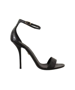 Marke: Dolce & Gabbana.
  Zustand: Nagelneu mit Etiketten.
  Stil: Sandalen mit hohen Absatzen.
  Farbe: Schwarz.
  Material: 100% Straussenleder.
  Sohle: Leder.
  Logo-Details.
  Hohe Qualitat und Komfort.
  Hergestellt in Italien.