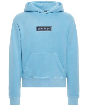 Sudadera con capucha y logotipo de caja teñida en prenda Palm Angels, logotipo de caja gotica de Palm Angels, bolsillo canguro, puños y dobladillo elasticos, 100 % algodon, fabricado en Portugal, sudadera con capucha azul
