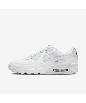 COMFORT, HERITAGE.NOTHING BETTER.  Nothing as fly, nothing as comfortable, nothing as proven. The Nike Air Max 90 stays true to its OG running roots with the iconic Waffle sole, stitched overlays and classic TPU details. Classic colours celebrate your fresh look while Max Air cushioning adds comfort to the journey.  Performance Comfort  Originally designed for performance running, the Max Air unit in the heel adds unbelievable cushioning. Versatile Style  The low-top design combines with a padded collar for a sleek look that feels soft and comfortable. Retro Vibes  The stitched overlays and TPU accents add durability, comfort and the iconic '90s look you love. Product Details  Textile upper with leather and synthetic overlays  Foam midsole  Rubber Waffle outsole adds traction and durability  Colour Shown: White/Photon Dust/Game Royal Style: FZ7186-100  Nike Air Max Origins  Revolutionary Air technology first made its way into Nike footwear in 1978. In 1987, the Air Max 1 debuted with visible Air technology in its heel, allowing fans more than just the feel of Air cushioning—suddenly they could see it. Since then, next-generation Air Max shoes have become a hit with athletes and collectors by offering striking colour combinations and reliable, lightweight cushioning.