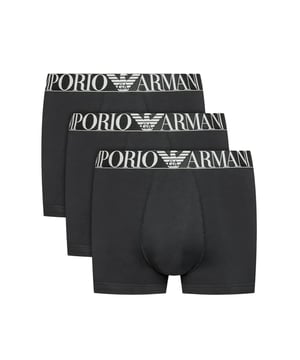Experience unparalleled comfort and premium style with the Emporio Armani 3 Pack Men's Cotton Stretch Trunks, designed to elevate your everyday essentials. Key Features:   Multipack: Convenient set of three trunks.  Iconic Branding: Features the signature Emporio Armani logo waistband.  Snug Fit: Engineered for a comfortable and supportive fit.  Breathable Fabric: Keeps you cool and dry throughout the day.  Supportive Design: Offers exceptional support for daily wear.