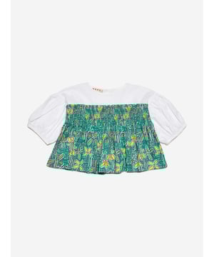 Marni's fresh invigorative perspective is embodied in this girls shirt. Inspired by the early noughties, it showcases poplin balloon sleeves with all-over Carioca graphics and a comfortable elastic. It is the perfect summer garment to be adored.   Button Closure On Back 100% Cotton