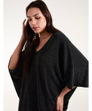 Instantly elevate a pair of jeans for a night out with this glitzy sparkly oversized top. Team with ankle boot heels and be ready for a fun night ahead.     