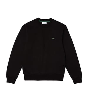 Solid-colored sweater with a round neckline, ribbed cuffs and subtle logo patches in a regular fit.