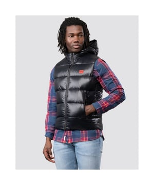 This sporty Water Repellent Puffer Hooded Gilet from HUGO is the perfect piece to elevate your wardrobe this season with sustainable style. Crafted from water-repellent recycled nylon and padded with sustainably sourced recycled fibres providing warmth and comfort. Featuring an insulated hood with full zip closure, elasticated binding and front zip pockets. Finished with a signature HUGO logo patch on the chest.Slim Fit, Water-Repellent Recycled Nylon Shell, Recycled Polyester Padding, Insulated Hood, Full Zip Closure, Twin Zip Front Pockets, Internal Zip Pocket, HUGO Branding. -Style & Fit:Slim Fit, Fits True to Size. Composition & Care:Shell: 100% Recycled Polyamide, Fill: 100% Recycled Polyester, Machine Wash.