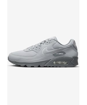 Crafted with comfortable and stylish features, the Nike Air Max 90 Wolf Grey White may just be your next essential piece. - -. This monochromatic pair has a mostly grey upper that consists of a breathable mesh base and leather overlays. - -.  Hints of white come via the Nike Swoosh outline and the “AIR MAX” branding near the rear. - -.  Comfort-wise, this Nike Air Max 90 has a padded tongue and a lace closure to ensure a snug fit. - -.  Underfoot, it rounds off with a dark grey midsole that houses a visible Nike Air cushioning.