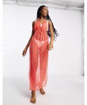 Product Details:
   White heart print
   Halterneck style
   Low back
   Tie fastening
   Thigh-high splits
   Relaxed fit
   Sheer chiffon
   Light, floaty fabric with a grainy feel

Materials:
   Main: 100% Polyester