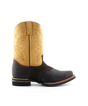 The Grinders El Paso boot is a standout style which includes colour contrasting panels separating the heel, vamp, and shaft which creates a great eye-catching aesthetic between the tan and black. The upper is crafted from top quality heavyweight leather and sports an eye-catching stitched design which is also seen on the vamp. This boot features a comfortable leather lining and insole, as well as a 1.5” block heel and a square toe front. The outsole is welted using the dependable Goodyear method and you can find the iconic Grinders Bulldog engraved into the bottom of the sole and heat embossed onto the outer side of the heel. • Goodyear Welted sole • Leather upper with detailed stitched design • Soft Leather lining • Stacked 1.5” block heels • Leather Soles • Made in Mexico