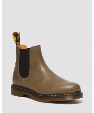 The classic 2976 Chelsea boot constructed from Carrara, set on DMs traditional bouncing air sole and secured with a yellow Goodyear welt stitch. Completed with easy on/easy off elasticated gusset. Signed with the unmistakable AirWair heel loop.
The 2976 boot is the rugged Docs take on the classic Chelsea boot. Manufactured since the 70sCarrara is a naturally untreated leather that develops character and a unique patina over timeThe DMS sole is a pillar of Dr. Martens construction — renowned for its comfort and stability. A two-tone appearance with distinctive grooving and an unmistakable tread patternConstruction - Made with a Goodyear-welted lines that are heat-sealed at 700˚C and reinforced with signature welt stitchFootbed - Wider and a more rounded toe shape