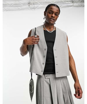 Suits by ASOS DESIGN Serving business chic V-neck Button placket Boxy fitSold By: Asos