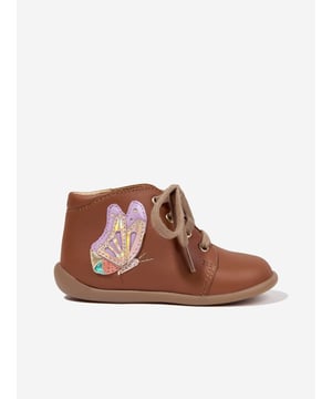 Introducing the Girls Butterfly Stand Up Boots in Brown by Pom D Api, a luxurious staple for your little one's collection. Combining chic design and premium comfort, it promises a classy touch for any occasion. Here are its unique highlights: Captivating Design: These boots feature a beautifully crafted butterfly motif, adding a whimsical yet stylish appeal. Premium Quality: Crafted with top-tier brown leather, they ensure an exceptional, long-lasting comfort, great for your child's daily adventures. Complete your little one's fashionable ensemble with these exquisite Butterfly Stand Up Boots from Pom D Api. Indulge in this fantastic pair today and let your angel stride in supreme style and comfort!