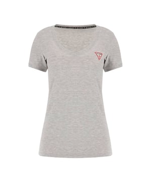 Das Damen-T-Shirt 'MINI TRIANGLE' von Guess besticht durch seinen eleganten V-Ausschnitt und die kurzen Ärmel. Als Basic-Teil ist es vielseitig kombinierbar und wird durch den dezenten Label-Print stilvoll ergänzt. Die elastische Stoffqualität sorgt für einen angenehmen Tragekomfort. Mit seiner Slim Passform betont es die Figur auf dezente Weise. Ein unverzichtbares Stück für jede Garderobe.