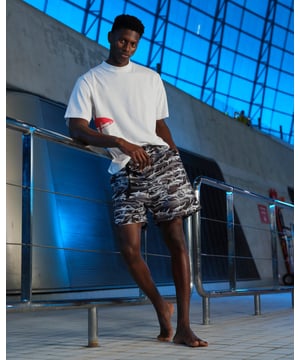 Made for those as shark-obsessed as us, these graphic print swim shorts are designed with a montage of our favourite fish, an elasticated drawstring waistband. Featuring functional side and rear pockets and mesh lining, they can take you from beach to bar.