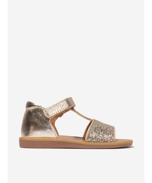 Presenting the Girls Poppy Tao Easy Buckle Sandals in Gold by Pom D Api - the ultimate addition to your girl's summer attire. It boasts a blend of luxury and comfort that's simply irresistible. Key features include:  Eye-Catching Design: These Sandals exude an aura of elegance and sophistication with their shiny gold colour, making your little one shine brighter. Easy Buckle: The easy-to-use buckle ensures the perfect fit while providing effortless style. High-Quality Material: Crafted with top-quality material for ultimate comfort and durability. Perfect Summer Wear: Its chic and breezy design makes it an unbeatable choice for sunny outings.revitalise your girl's closet with these chic Poppy Tao Easy Buckle Sandals in Gold from Pom D Api. Let your princess step into style!