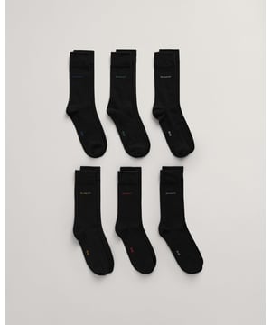 Gant 6 Pack Men's Soft Cotton Socks. The perfect daily socks, designed in classic solid colour to fit seamlessly into any smart wardrobe. Made from a super soft cotton blend, they feature a double welt hem and iconic multi colour Gant logo above the ankle.  Key Features  Dress Fit Double welt hem Pack contains 6 pairs