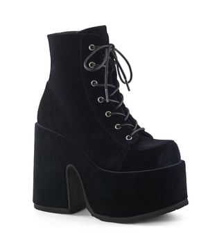 Demonia's Camel 203 is the ultimate chunky platform boot. These boots attract attention and will be the focal point of any room with their lush black velvet uppers, 5" chunky rubber heel, and 3" platform sole. These are easy to put on and adjust, featuring a rear silver zipper and 7 eyelet laces. Comfortable and long-lasting, whether you're aiming to make a statement or looking to add a new staple, your wardrobe will love these babies!