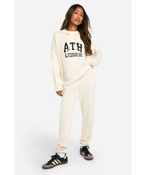 Oversized hoodie and jogger set for ultimate comfort
        Bold 'Ath Leisure' embroidery adds a sporty edge
        Roomy hood for extra cosiness and style
        Relaxed fit joggers with tapered ankles
        Versatile two-piece set for mix-and-match styling
    
    Embrace laid-back chic with this oversized hoodie and jogger set, perfect for those who prioritise both style and comfort. The bold 'Ath Leisure' embroidery adds a sporty touch to this casual ensemble, making it ideal for weekend lounging or running errands in style. Pair with trendy trainers for a casual day out, or dress it up with statement jewellery and ankle boots for a fashion-forward athleisure look. The versatility of this set allows for endless styling options - wear together for a coordinated appearance or separately to create multiple outfits. Ideal for casual gatherings, lazy Sundays, or even as a comfy travel outfit, this tracksuit set is a must-have addition to any fashion-savvy wardrobe.