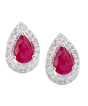 9K (375) witgoud: 2,04 gram; # Diamant: 0,19 ct; # Robijn: 1ct