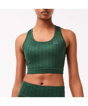 Women's Lacoste SPORT Printed Sports Bra.- Tight fit, very adjusted cut: Highlights your silhouette.- Removable cookies: For extra support. Flat seams: Prevents rubbing and irritation.- Silicone crocodile sewn onto front: Lacoste squared.- Recycled polyester: High-tech and environmentally-friendly. Material: 77% Polyester, 23% Elastane. Ref: TF3422D1R.