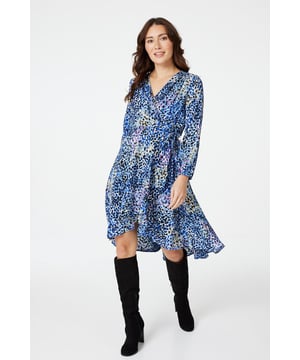No wardrobe is complete without a bold ditsy print wrap front skater dress. With a deep v-neck, long sleeves, a tie detail waist and a knee length high low skirt. Style with strappy heels for a special occasion or pair with pointed courts for work.