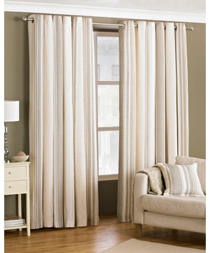 A wonderful and well co-ordinated stripe design allows the Broadway lined eyelet curtains to provide a touch of contemporary appeal to any room. Fully lined and crafted from cotton rich material, the Broadway curtains create a tastefully stylish atmosphere, along with an eyelet ring top heading for that extra modern touch. Made of polycotton these curtains are incredibly soft making them fall effortlessly while also able to withstand the everyday wear and tear of a hectic household. These curtains feature stainless steel eyeless holes for easy installation with no need for hooks or rings - you need only supply the curtain pole. As these curtains are a delicate addition to your home they will need extra care and are therefore dry clean only, however can still be ironed.
