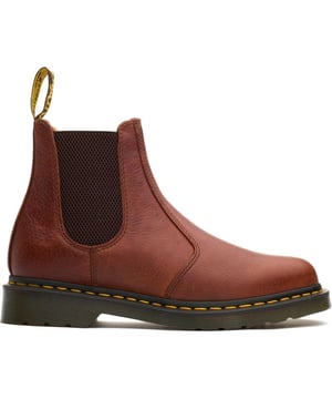 The Tan Dr. Martens 2976 Chelsea Boots Have A Leather Upper, The Iconic Yellow Stitching, And Airwair Heel Loop, Which Gives Them That Doc Martens Edge. Featuring The Famous Air-cushioned Airwair Sole With The Traditional Rugged Tread And Goodyear Welt For Enhanced Durability. These Shoes Stand Out From The Crowd In The Legendary Docs Look.