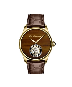 Combining the art and craft of hand made lapidary with the stunning workmaship of master watchmakers, this Limited Edition timepiece is more than a timepiece.  It is a truly remarkable heirloom that is destined for the most discerning of timpiece collections. A tourbillon movement offers an impeccable, incredible experience of time married to the work of craftsmen driven to manufacture each timepiece individually, by hand in very small numbers.