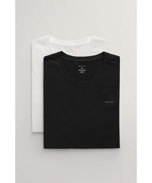 Classic crewneck design for timeless appeal
        Short sleeves for versatile wear across seasons
        Convenient 2-pack in essential black and white
        Subtle Gant branding for a refined touch
        Crafted from 100% cotton for comfort and breathability
    
    These Gant crewneck t-shirts are the epitome of casual chic, offering unparalleled versatility for your wardrobe. Perfect for layering or wearing on their own, these tees transition effortlessly from relaxed weekend brunches to casual Fridays at the office. Style the white tee with dark wash jeans and trainers for a crisp, clean look, or pair the black version with checked trousers and loafers for a smart-casual ensemble. The simple yet refined design makes these t-shirts ideal for family gatherings or informal outings with friends. Their cotton composition ensures all-day comfort, whether you're running errands or enjoying a laid-back evening at home. With this duo, you'll always have a reliable option for those moments when you need to look put-together without compromising on comfort.