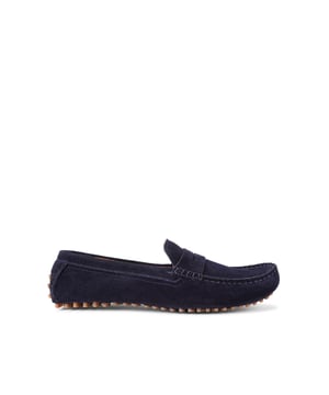 Rocky from KG Kurt Geiger is a slip-on shoe in a penny loafer style, featuring a navy suede upper.