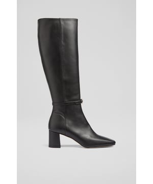 Sleek, stylish and absolutely timeless, the new Sylvia knee-high boots are part of our first-ever autumn Ascot collection. Crafted in Spain from beautiful black calf leather, they have a softly-squared toe, chic buckle detail to the front of the ankle, an inside zip and a leather-wrapped block heel. The perfect boots to pull-on this winter, and for many to come. They've got staying power.