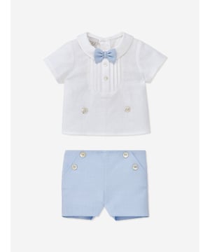 Presenting the Baby Boys Linen Shorts Set in Multicolour ‚ a chic staple for your toddler's attire, ideal for Eid festivities. Here's why it shines: Made in Spain: Expertly crafted with unmatched attention to detail by renowned brand Paz Rodriguez, promising durability and longevity. Striking Pattern: The vibrant multicoloured print makes for a contemporary, eye-catching statement piece. Peak Comfort: High-calibre material ensures unblemished comfort for your baby boy's everyday exploits. Add flair to your Baby Boy's wardrobe with this Multicolour Linen Shorts Set from Paz Rodriguez. Order today for an unforgettable, stylish Eid!