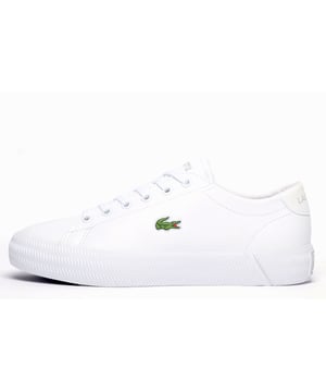 With its premium leather construction and classic, low-profile silhouette presented in a smart white colourway, the Lacoste Gripshot delivers a look thats both casual and stylish. Full of designer touches, premium craftmanship and finished off with the famous Lacoste Croc on the side, this no-nonsense trainer will deliver a touch of laid-back style to any casual or dress outfit. 
 - Premium Leather upper
 - 6 eyelet lace up fit
 - Ortholite footbed
 - Textured vintage styled midsole
 - Durable rubber outsole
 - Lacoste branding throughout
 PLEASE NOTE:
 These Lacoste trainers are sold as B grades which means there may be some very slight cosmetic issues on the shoe and they come in a Lacoste box with the Lacoste brand authenticity details attached to it. We have checked every pair of these shoes and in our opinion at these heavily reduced prices all are very saleable. All shoes are guaranteed against fair wear and tear and offer a substantial saving against the normal high street price. The overall function or performance of the shoe will not be affected by cosmetic issues. B Grades are original authentic products released by the brand manufacturer with their approval at greatly reduced prices. If you are unhappy with your purchase we will be more than happy to take the shoes back from you and issue a full refund. Possible imperfections may include some, all, or on some occasions none of the issues stated: Scuff marks to the upper; glue spots to the upper; general discolouring imperfections to the upper, occasionally some discolouring of the sole. If there are visible marks on the shoe which is very rare, once the shoes have been worn two or three times any initial marks will blend into the overall appearance of the shoes.