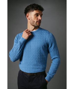 Cotton Cable Crew Neck from Maine. Upgrade your knitwear attire with statement styles and discover this must-have men's cotton jumper. Featuring long-fitted sleeves with stretch cuffs, a circular neckline, and a tailored cut finish for the perfect fit.  Made from 100% Cotton. Wash at 40. Model wears a Size M.