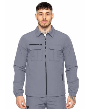 Expertly designed for outdoor activities and the transition to mid-season, this shirt jacket is constructed of crinkle nylon that is both water-repellent and wind-resistant. The fabric has a soft peach-fuzz feel and is complemented by a pointed collar, functional pockets, and a zip fastening to easily adjust the fit. The jacket is made with patch pockets and a flap on the chest, making it both functional and stylish.