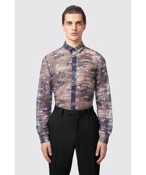 Say hello to the latest addition to the Twisted Tailor shirt collection. The Caples is something a bit different for your shirt rotation; The Caples combines a beautiful blue and cream print with a mesh fabric making this a perfect going out out top. The fabric means it's lightweight and easy to wear coming into the Summer months. Pair the shirt dressed up or down with some suit pants or wide leg trousers.
