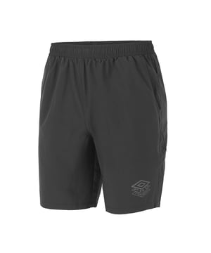 The Umbro Pro Training Woven Men's Black Shorts are designed to provide comfort, durability, and optimal performance during your training sessions. These shorts are a perfect blend of style and functionality, making them an essential addition to your athletic wardrobe.

Crafted from high-quality woven fabric, these shorts offer a lightweight and breathable feel, allowing for excellent airflow and ventilation. The fabric is also quick-drying, ensuring that you stay cool and comfortable even during intense workouts.

The shorts feature a sleek black color that adds a touch of sophistication to your athletic ensemble. The clean and minimalist design makes them versatile, suitable for a variety of training activities and sports.

With an elastic waistband and an adjustable drawstring, these shorts offer a secure and personalized fit. This allows you to customize the waist size according to your preference, ensuring maximum comfort and freedom of movement.

Designed with a regular fit and a mid-thigh length, these shorts provide a balance of coverage and flexibility. The roomy cut allows for a wide range of motion, enabling you to perform dynamic movements with ease.

Whether you're engaging in high-intensity workouts, running, or playing team sports, the Umbro Pro Training Woven Men's Black Shorts are designed to keep up with your active lifestyle. Their combination of comfort, durability, and sleek design make them the ideal choice for any training session. Elevate your performance and style with these premium athletic shorts from Umbro.