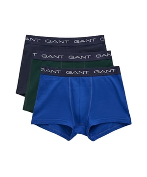 Gant 3er-Pack Herren-Trunks. Diese klassischen 3er-Pack-Trunks sind aus leichtem Baumwollstoff mit einem Hauch von Stretch-Jersey gefertigt und bieten eine enge Passform für ganztäglichen Komfort. Sie verfügen über einen kurzen Beinanschnitt, einen mittelhohen Bund und einen jacquard-gewebten elastischen Bund mit dem Gant-Logo in einem wiederholenden Muster. Jedes 3er-Pack enthält drei Trunks in einfarbiger Ausführung. Wichtige Merkmale: Stretchstoff, bequeme Trunk-Passform, 3er-Pack.