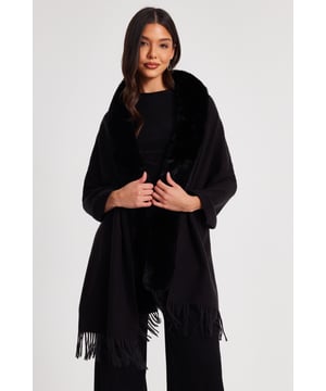 - Knitted - Faux fur collar - Tassel finish - Cape style - Always check the care wash label - Cool hand wash with mild detergent