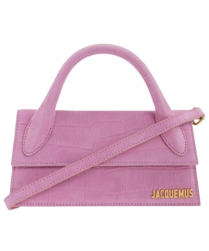 Deze tas van Jacquemus is het perfecte accessoire voor degenen die een klassiek tintje willen toevoegen aan hun dagelijkse look, Jacquemus roze tas, sluiting met sluiting, gemaakt in Italie, 100% leer, effen roze tas, de Chiquito lange tas, kleine tas