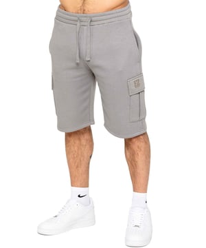 Experience comfort and style with Enzo's Men's Cargo Fleece Shorts. Made with brushed back inner fleece, these shorts offer a regular fit with 2 side pockets and 2 cargo pockets. The elasticated waistband, featuring the EZ logo, is adjustable with a drawstring for the perfect fit.