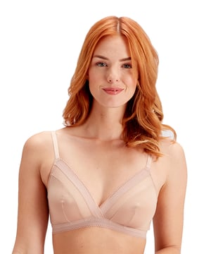 Our Naturals collection is made with a lightweight and breathable microfibre. An everyday essential, boasting wearable designs that make you look and feel great. Creme brulee is a delicate and creamy shade, perfect to pair with light coloured clothing. The perfect comfort bra with no wires or padding, that moves with your body. It has a delicate picot trim and mesh panels to add a feminine feel. Due to its stretch and comfort, this triangle bra is offered in dress sizes rather than cup sizes.