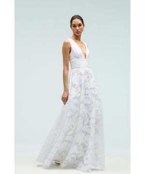 Modern fairytales start with a dress that takes everyone's breath away. Romantic notes can be found throughout this gown, featuring a scoop neck and back, wisp waist a full skirt to comple this dreamy piece. Made from jacquard: opulent and highly tactile, this fabrication is characterised by an embroidered pattern with a textured appearance. A heavyweight base provides this luxurious textile with distinctive structure, holding the shape of designs to perfection. Level of stretch: none. This dress fastens with a rear concealed zip. Model is 5ft 10in/1.77m and wears a size UK10.