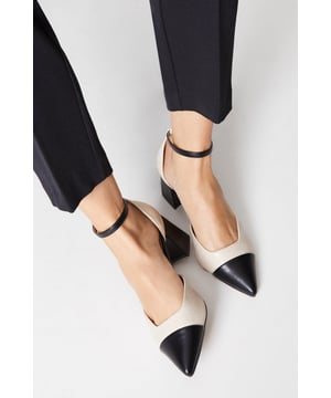 Introducing our stylish black pointed toe heels with an ankle strap. These elegant heels feature a smart toecap, adding a touch of sophistication to any outfit. With their sleek design and comfortable fit, these heels are perfect for both formal occasions and nights out on the town. Step out in style and make a statement with these versatile and fashionable heels.