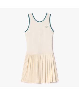Dames Lacoste Sport Ultra Dry Tennis Jurk met Uitneembare VoeringDeze jurk is getest door Lacoste-spelers en ontworpen voor de meest intensieve tennissessies. Gemaakt van ripstop stretch piqué voor bewegingsvrijheid met Ultra Dry technologie voor comfort. Geraffineerde afwerkingsdetails zoals dubbele plooien geven een elegante vrouwelijke twist aan je on-court look.- Ultra-Dry Stretch Tennisjurk en Shorts - Gerecyclede polyester piqué stof van productieafval- Open rug - Gewijzigde plooien over twee breedtes- Verwijderbare short- Ultra-Dry vochtafvoerende technologie- Getest door tennissers- Siliconen krokodil op borst- Hoofdstof: 100% polyester.  Korte broek: 82% Polyester 18% Elastaan.  Machinewasbaar.- Ref: EF7451-IV9Let op: dit model wordt verkocht als set.  Retourzendingen worden alleen geaccepteerd als beide artikelen samen worden geretourneerd.