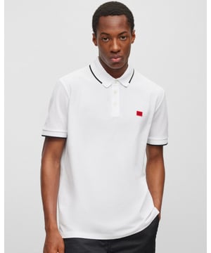 A slim-fitting polo shirt in piqué fabric with a branded patch and sporty tipping by HUGO Menswear.
Slim fitPolo collarShort sleevesRibbed cuffs
100% Cotton, Collar: 99% Cotton, 1% Elastane
50490775
 