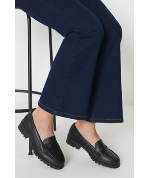 Chunky faux leather loafers with a wide fit for added comfort
Sleek and minimal design with a classic penny loafer silhouette
Durable and textured rubber outsole for enhanced traction
Slightly raised heel for a subtle lift
Easy slip-on style with a convenient loafer construction

These wide fit loafers from Dorothy Perkins exude a timeless and versatile appeal, making them an ideal choice for casual everyday wear. The faux leather upper lends a polished look, while the chunky sole adds a contemporary touch. Pair them with tailored trousers or a flowy dress for a chic and effortless ensemble, perfect for brunch dates, family gatherings, or casual outings with friends. Their comfortable wide fit ensures all-day wearability, allowing you to step out in style without compromising on practicality.